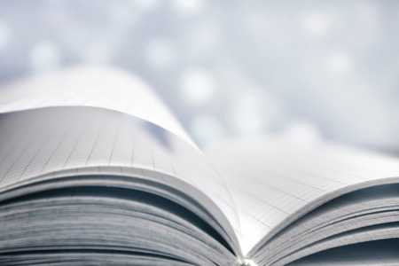 Opened book soft bright light