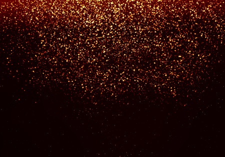 Golden bokeh isolated on black background