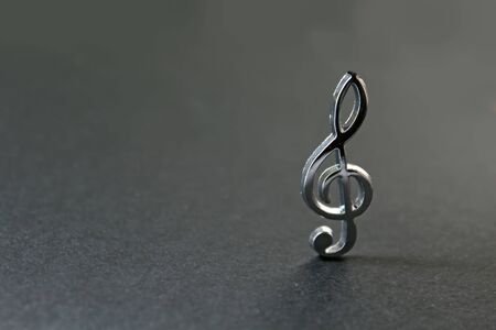 Treble clef isolated, background for textの写真素材