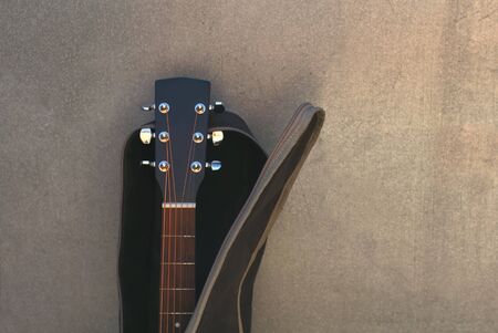 Acoustic guitar in the case, close upの写真素材