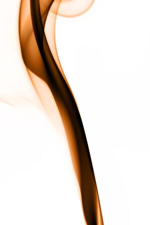 Orange smoke on white backgroundの写真素材