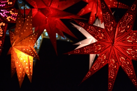 Red lights star on a black background