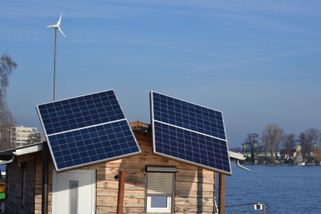 two solar panels on wooden houseのeditorial素材