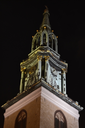 the clock tower illuminated at nightの写真素材