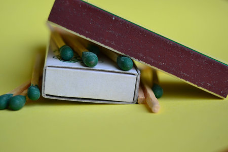 Wooden matches with green grayの写真素材