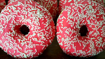 donuts with pink glaze closeupの写真素材