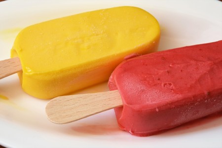 sherbet fruit natural on sticks on a white backgroundの写真素材