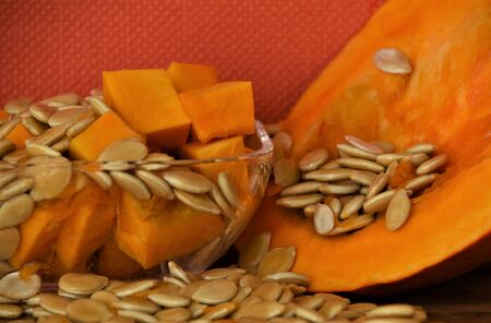 Fresh raw pumpkins and seeds close-upの写真素材