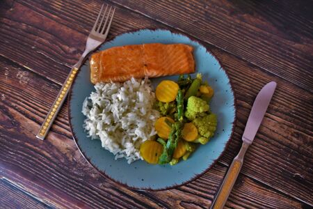 Fish with rice and vegetablesの写真素材