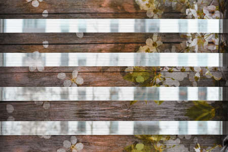 Wooden background with cherry blossoms. Vintage style. Selective focus.