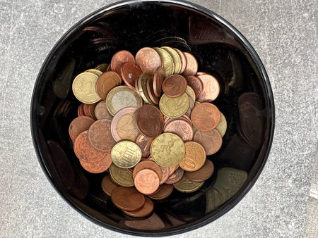 black Ñup with metal euro cents