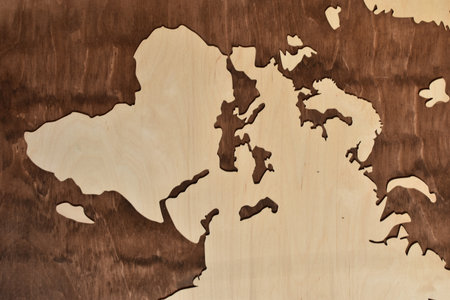 Map of the world on a wooden surface. Abstract background for design.の写真素材