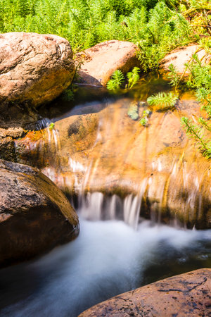 Water Flowing at Maesa Noi Waterfall, Thailand.の写真素材