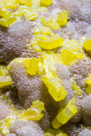 Macro shot of a pile of yellow crystals of amethyst.の写真素材