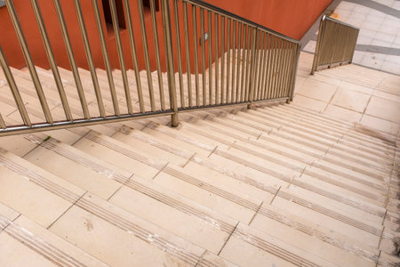 staircase with metal railings in the center of the cityの写真素材