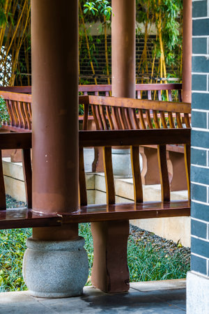 Wooden chair in the garden, Thailand. (Selective focus)の写真素材