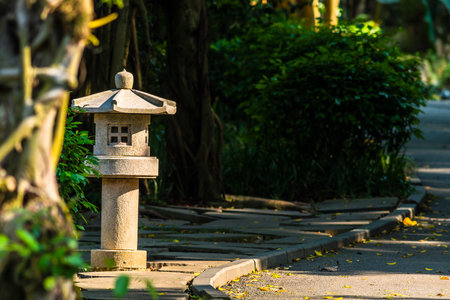 Stone lantern in Japanese garden, Thailand. (Selective focus)の写真素材