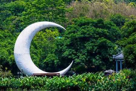 Moon and chair in the park, Thailand. Beautiful landscape.の写真素材
