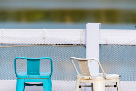 Chairs on the deck of a cruise ship. Selective focus.の写真素材