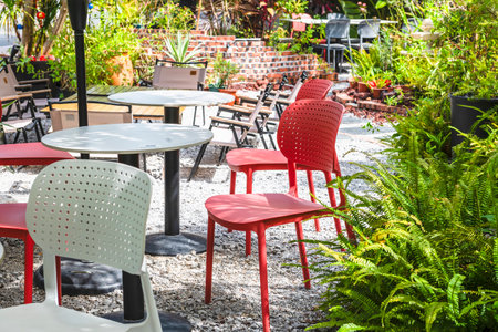 Outdoor cafe with table and chairs in the garden, stock photoの写真素材