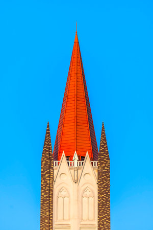 Beautiful Architecture building Exterior with church tower and blue sky backgroundの写真素材
