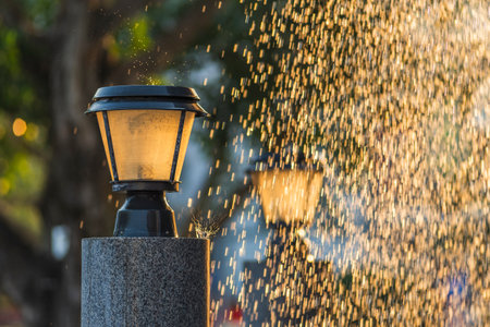 Lantern on the street with golden bokeh background.の写真素材