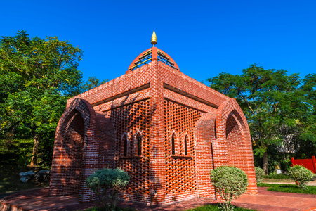 Beautiful red brick church with blue sky background,Thailand.の写真素材
