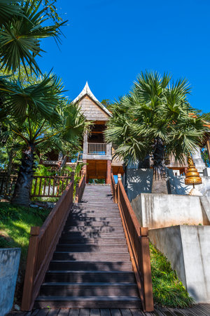 Wooden stairway to buddhist temple in Chiang Mai, Thailandの写真素材