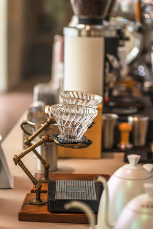 Coffee machine and glass cup in coffee shop, stock photoの写真素材