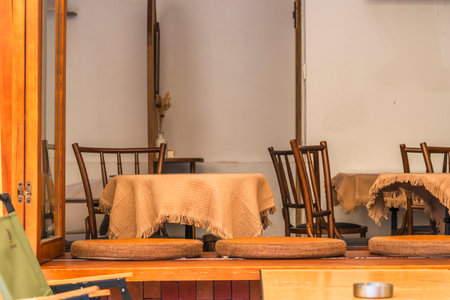 Wooden chairs and table in a restaurant, stock photo image.の写真素材