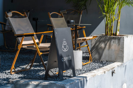 Restaurant Chairs and Cafe Sign on the Table, stock photoの写真素材