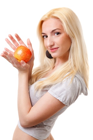 beautiful blonde girl with red appleの写真素材