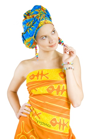 beautiful girl in colorful clothes holding her earringの写真素材