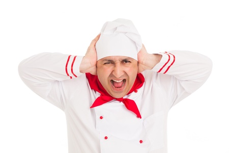 cook man wearing uniform screams over white background の写真素材
