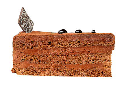 chocolate cake with black round decorationsの写真素材