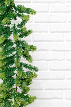 Christmas white background with snow fir tree. Top view with copy space for your textの写真素材