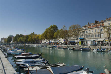 Rijeka (Italian and Hungarian Fiume, other Croatian dialects: Reka or Rika, Slovene: Reka, German: Sankt Veit am Flaum or Pflaum (both historical)) is the principal seaport of Croatia, located on Kvarner Bay, an inlet of the Adriatic Sea.の写真素材