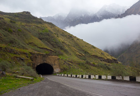 the mountain road going into the tunnel, Georgiaの写真素材