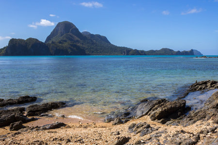 Rocky beach with clear seaの写真素材