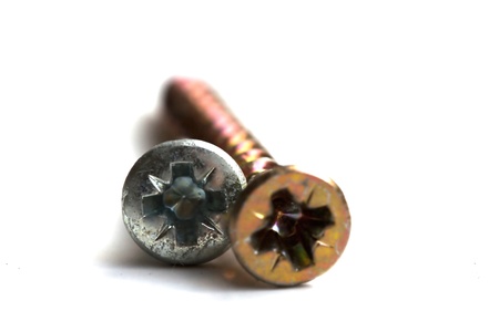 two screws on a white backgroundの写真素材