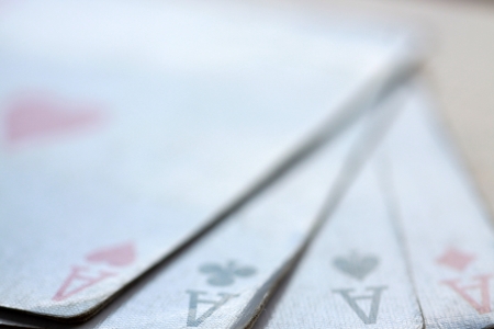 old poker cards on the table
