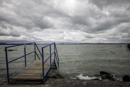 view of the Balaton lake with cloudy skyの写真素材