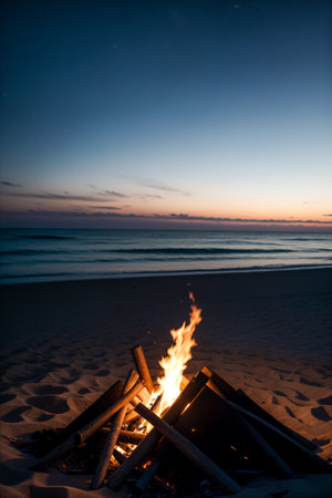 Bonfire at sunset on the ocean beachの素材