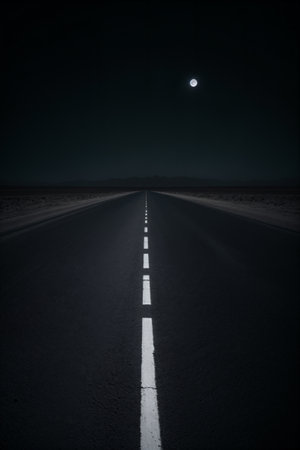 Black asphalt road at night.の素材