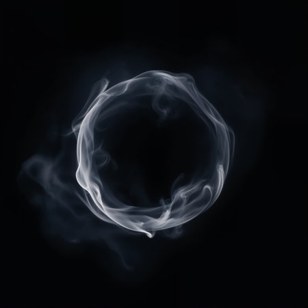 Circle shaped smoke ring on a black background, abstract smoke frame for your design.の素材