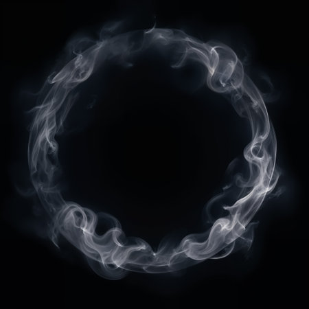 Circle shaped smoke ring on a black background, abstract smoke frame for your design.の素材
