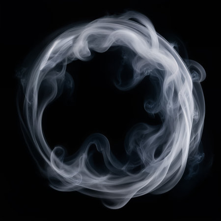 Circle shaped smoke ring on a black background, abstract smoke frame for your design.の素材