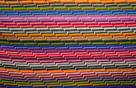 Stripy colorful knitted background in different coloursの写真素材
