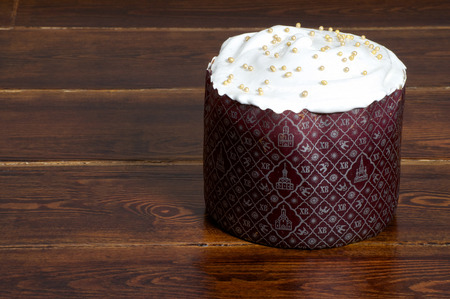 Easter cake over wooden background  with white top