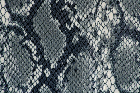 Grey fabric background close up with animal printの写真素材